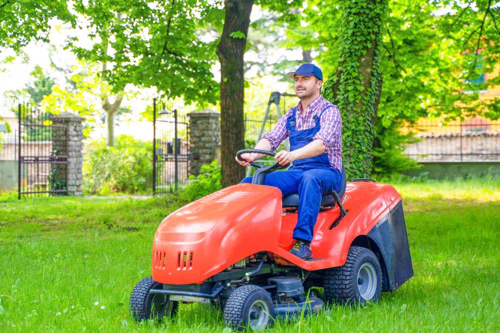 man-riding-lawn-mower